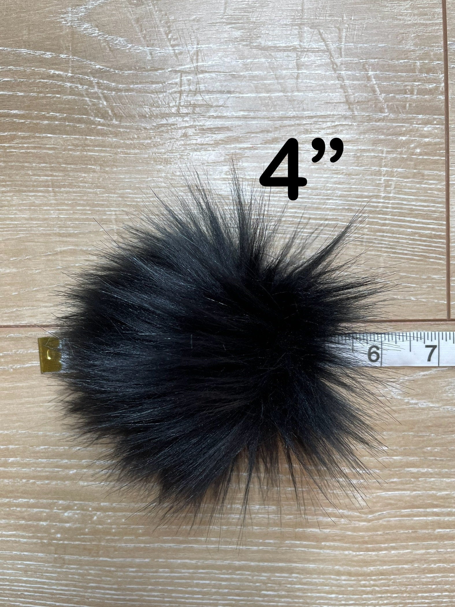 Black fluff faux fur pom pom
