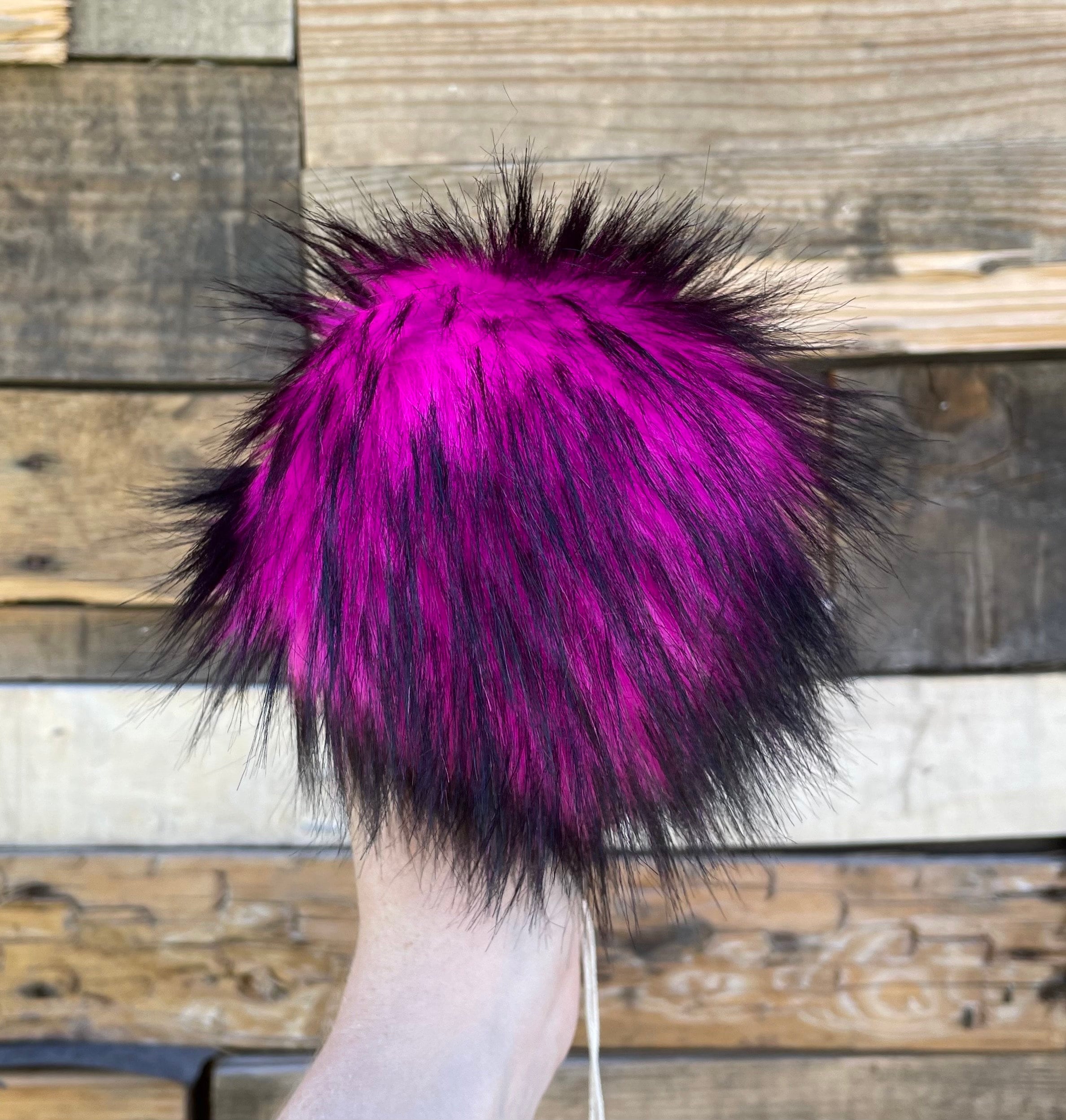 Pink nights faux fur pom pom