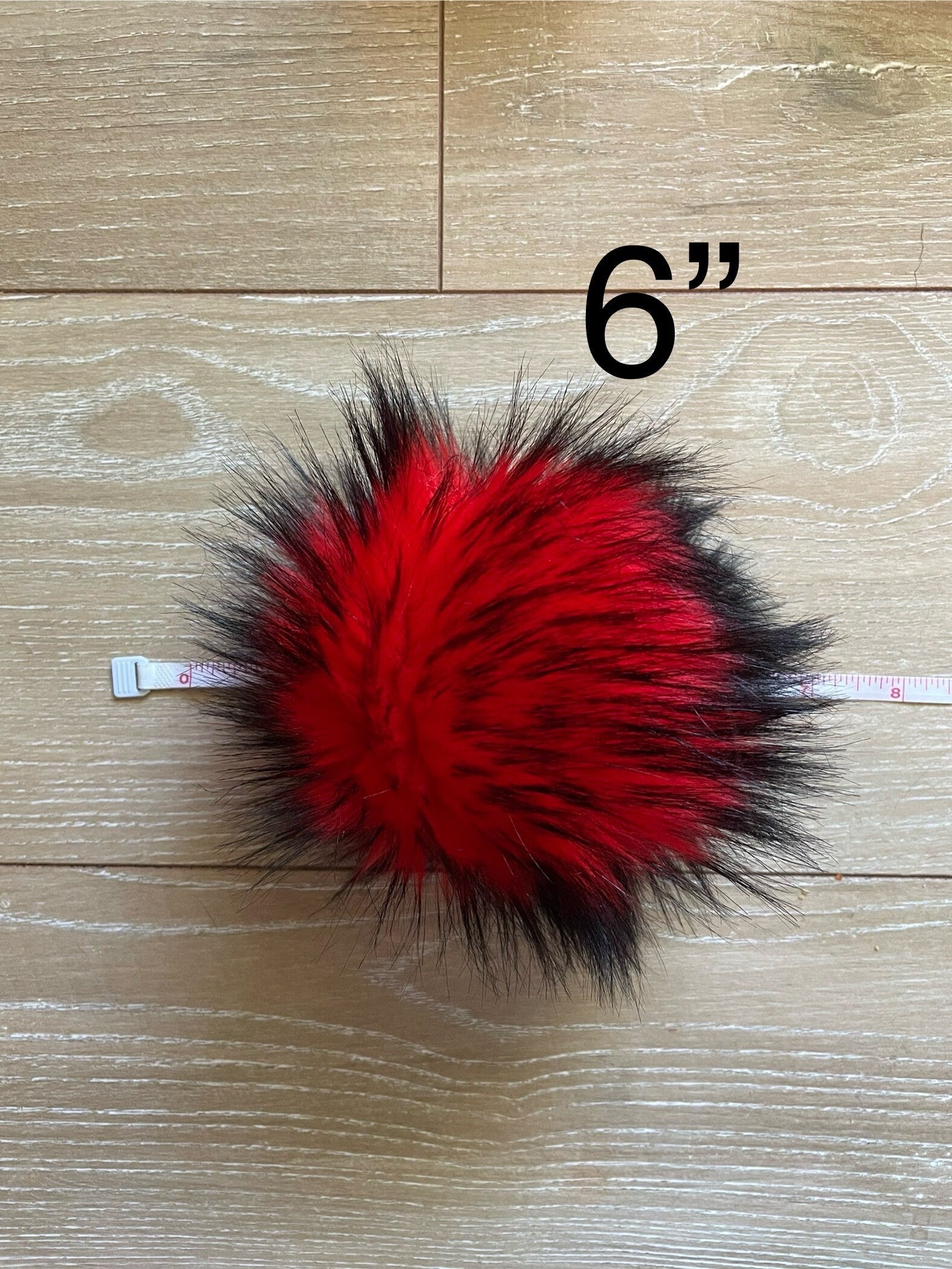 Red nights faux fur pom pom