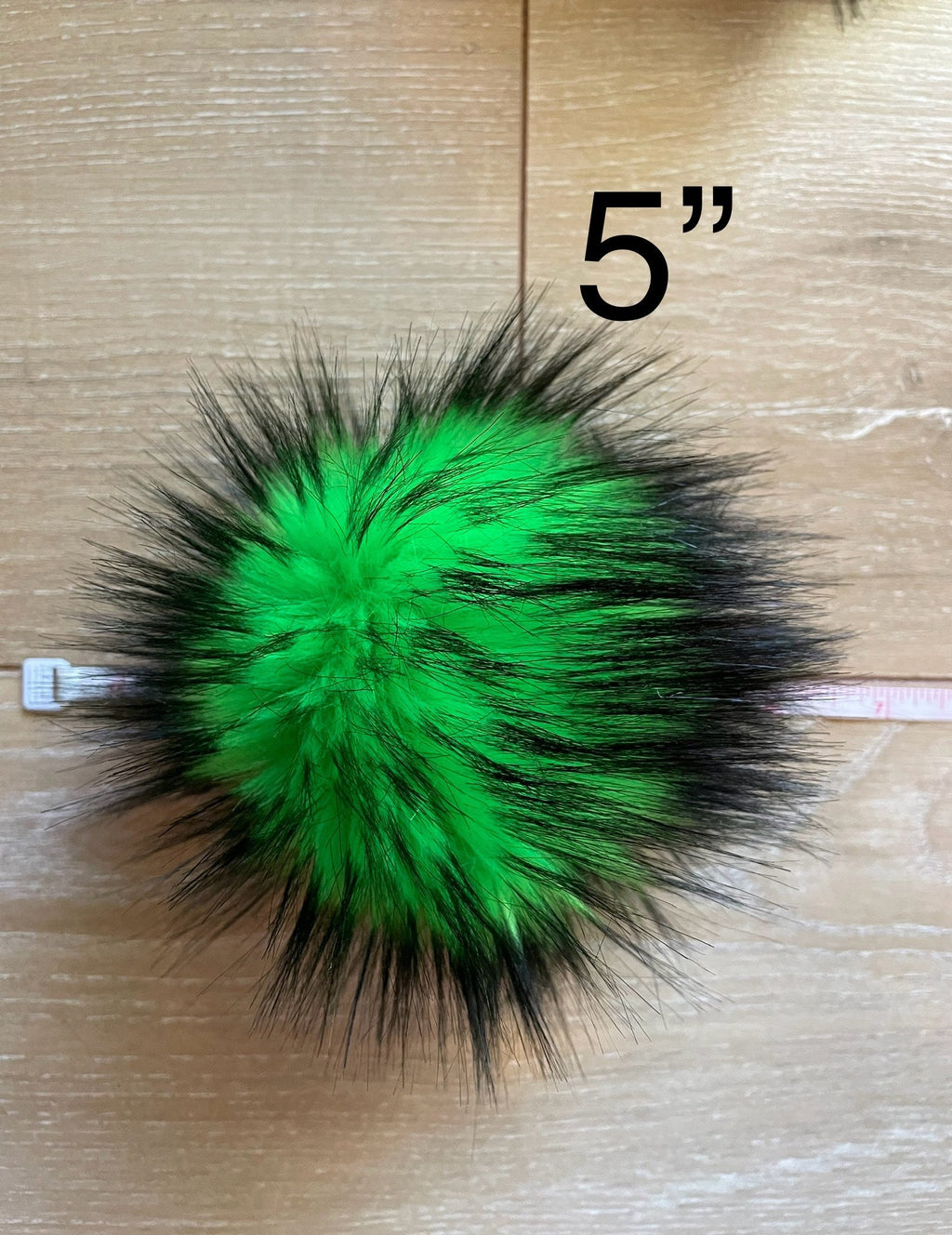 Green nights faux fur pom pom