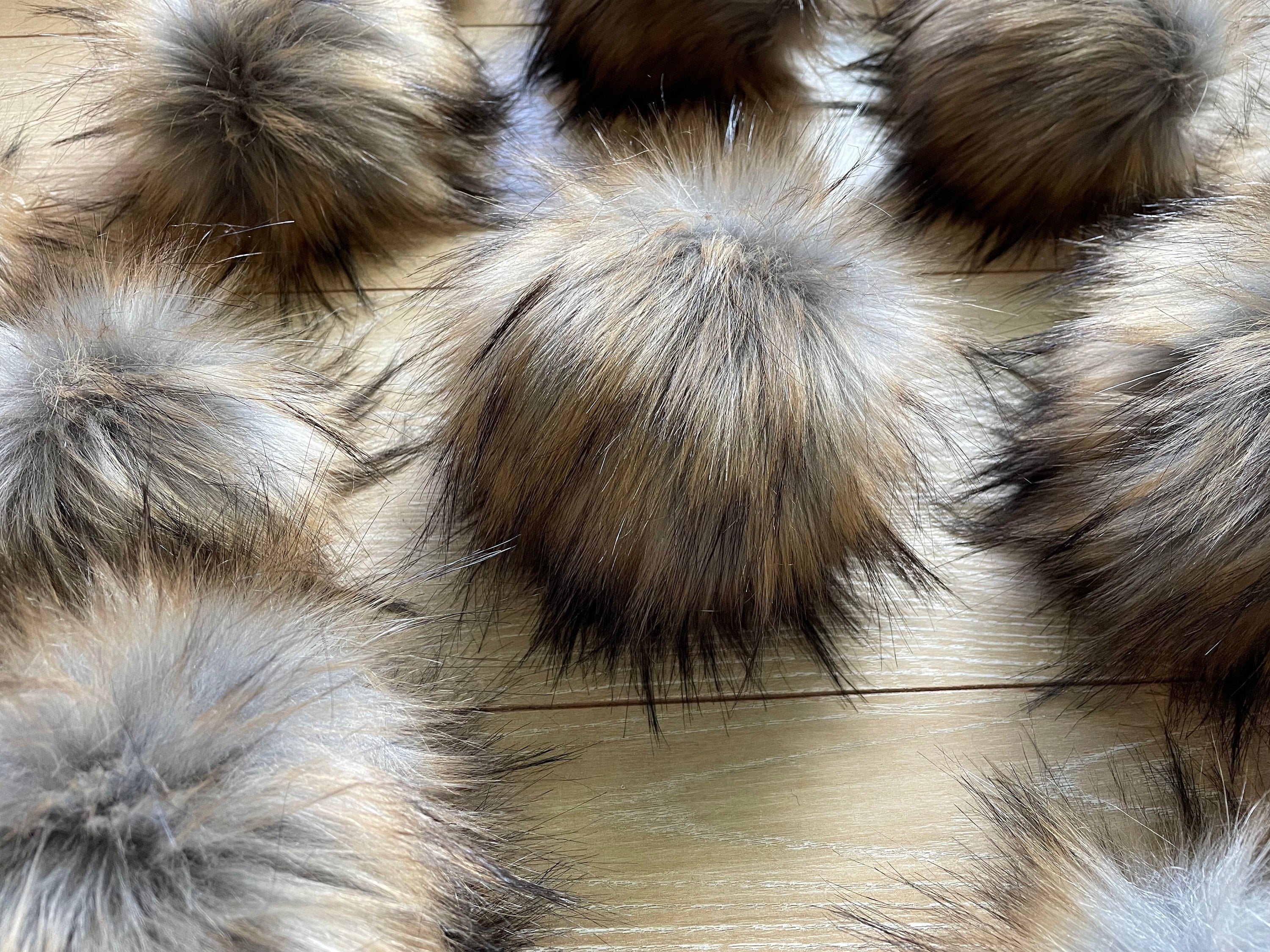Raccoon luxe faux fur pom pom