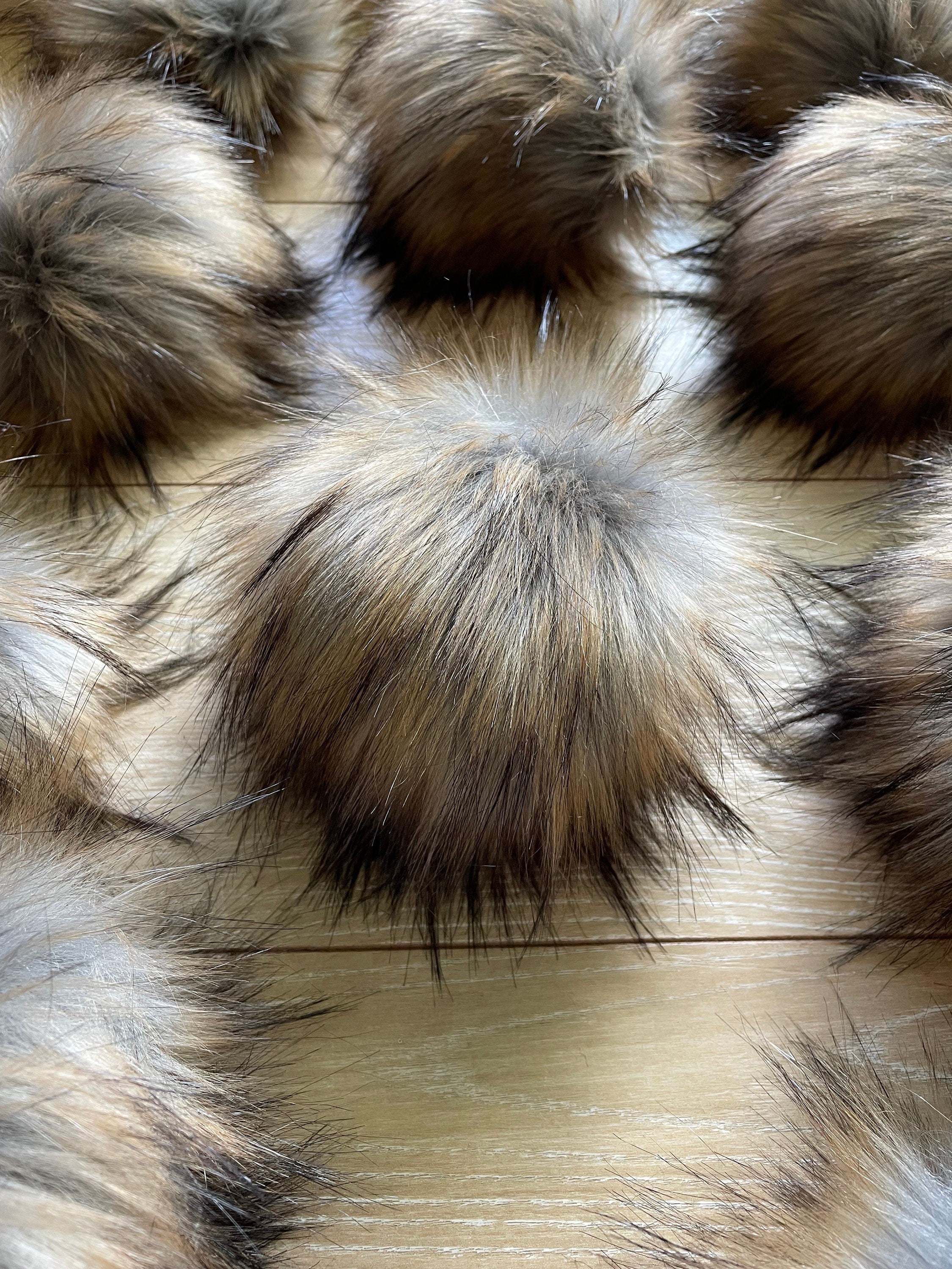 Raccoon luxe faux fur pom pom