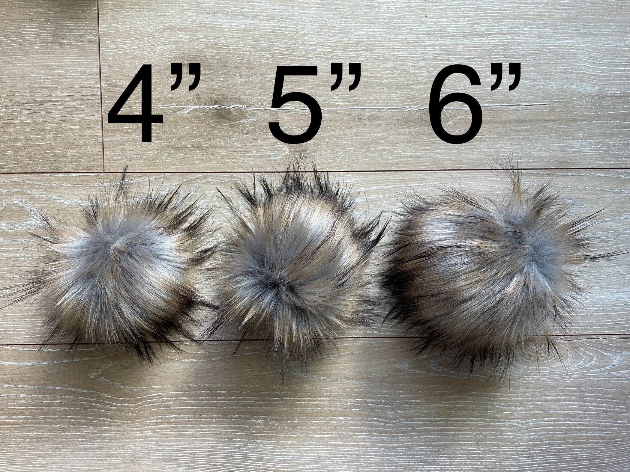 Raccoon luxe faux fur pom pom