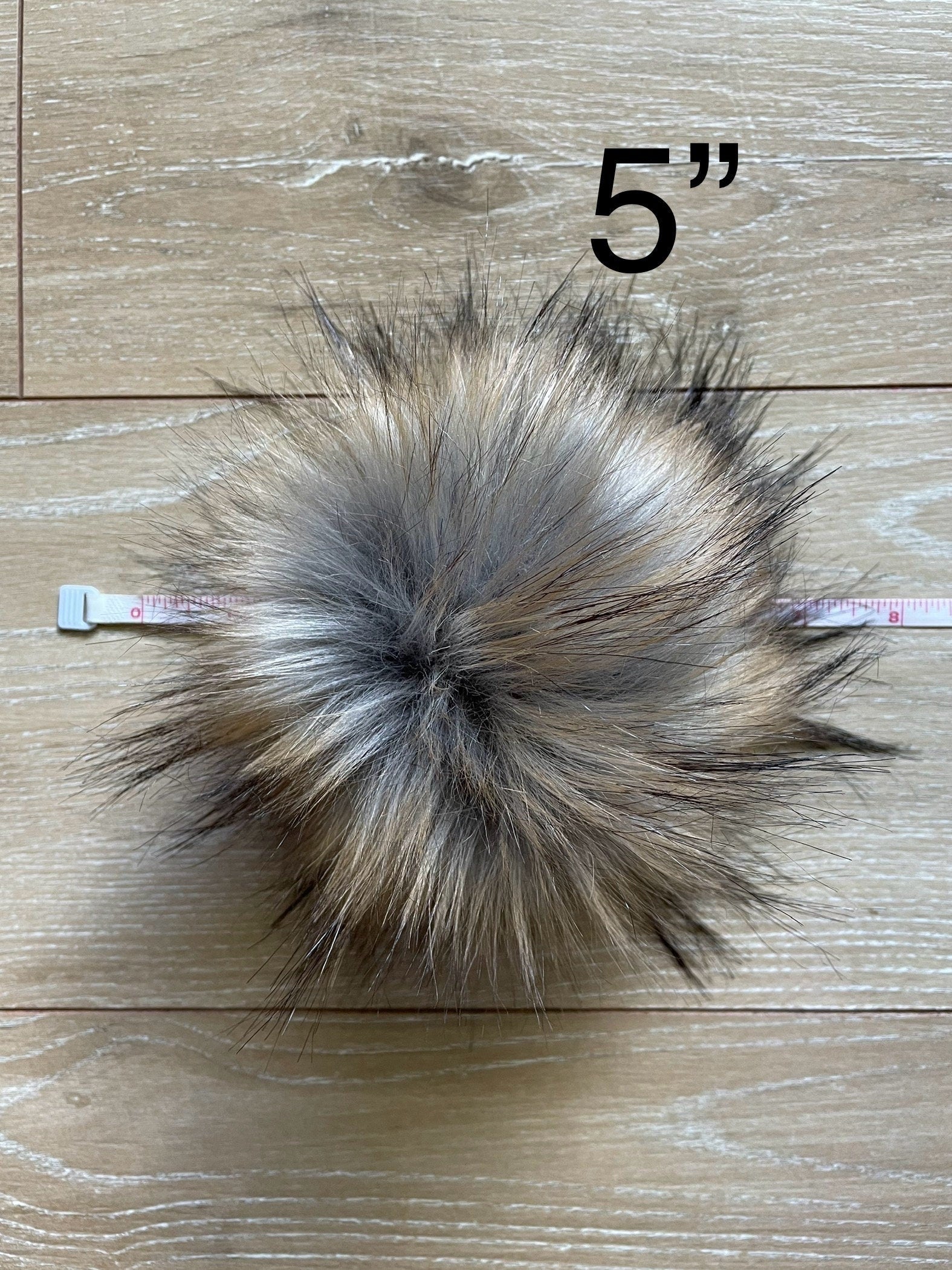 Raccoon luxe faux fur pom pom