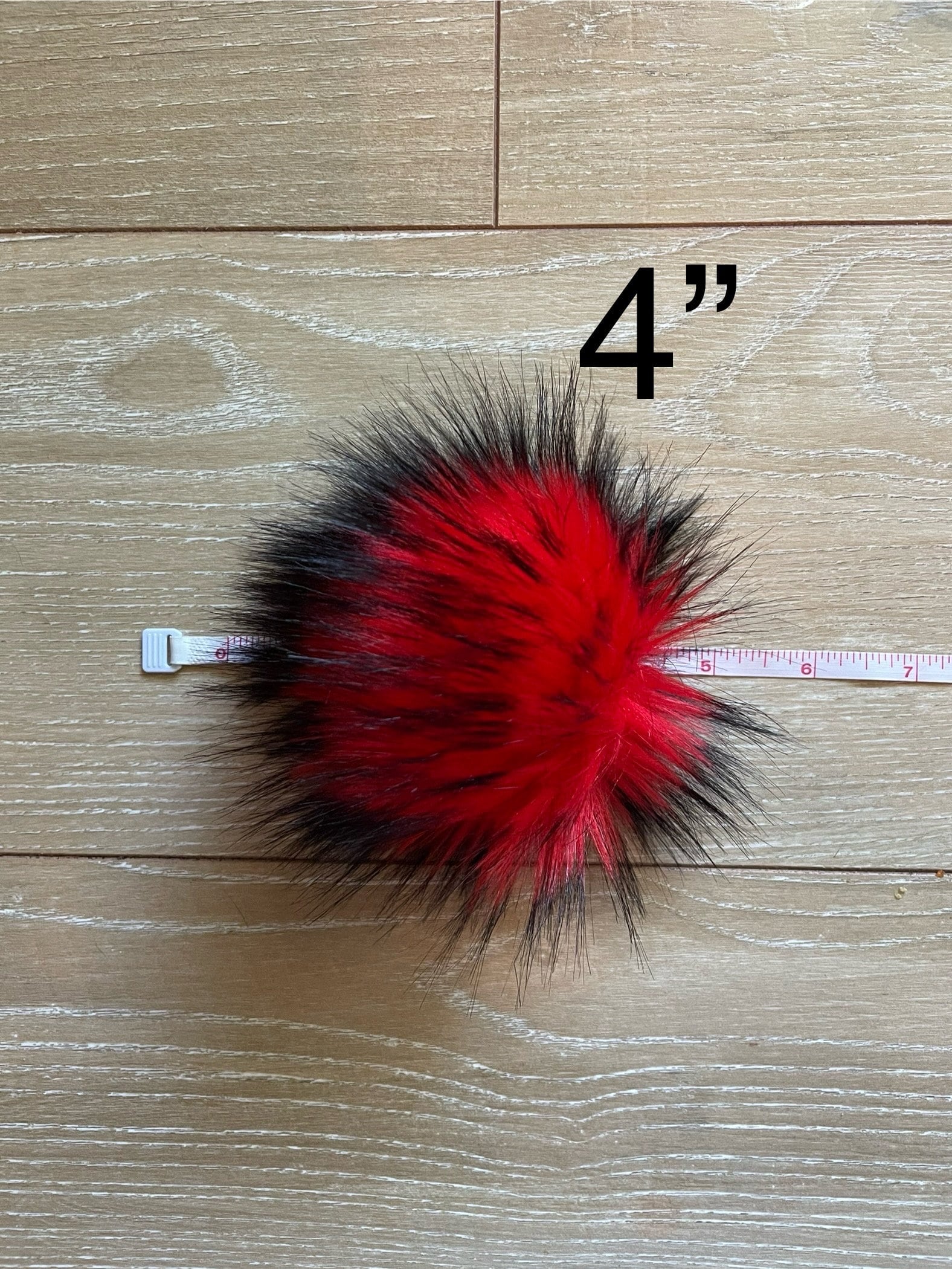 Red nights faux fur pom pom