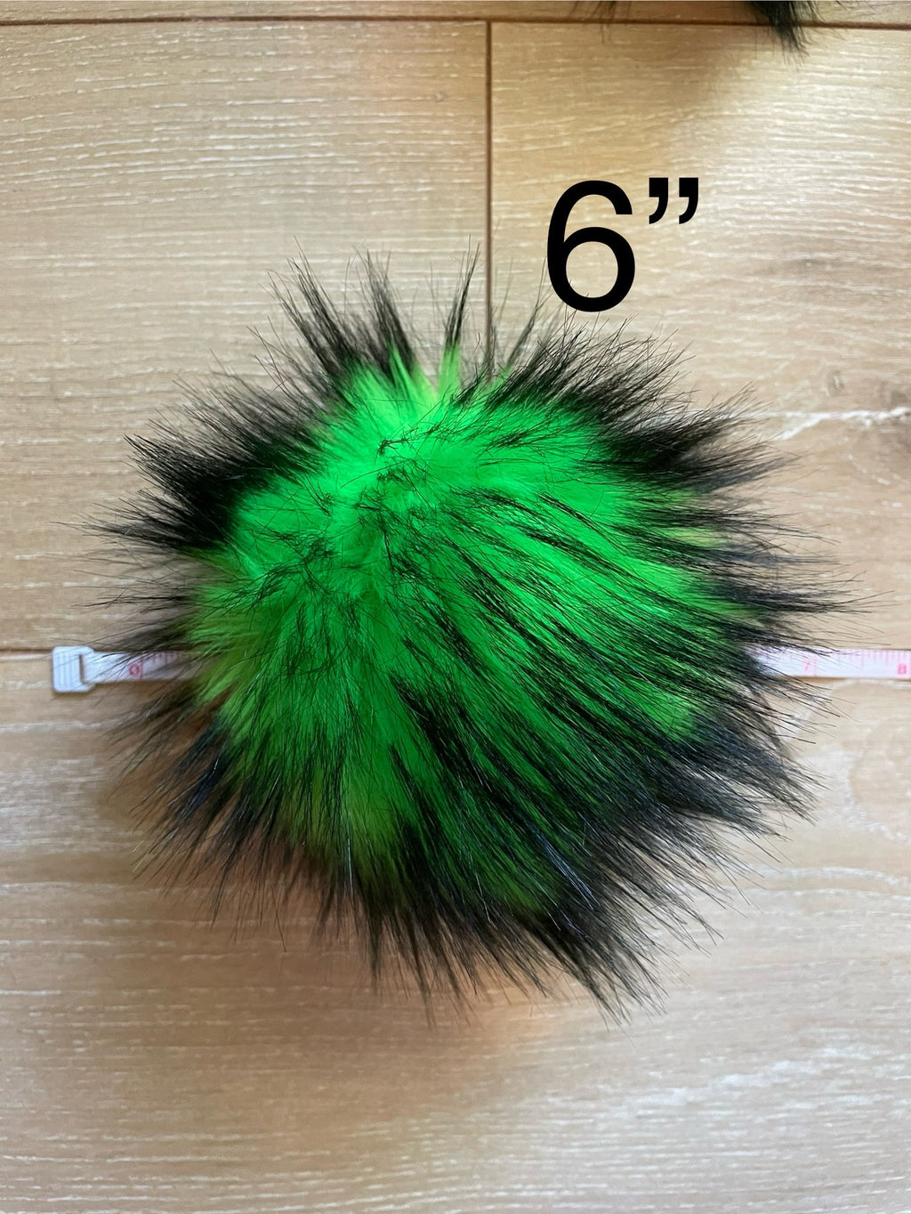 Green nights faux fur pom pom