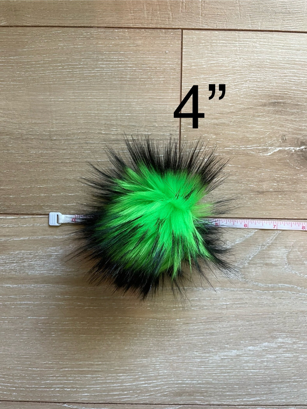 Green nights faux fur pom pom