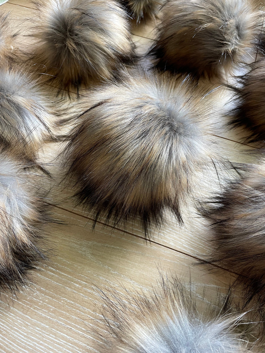 Raccoon luxe faux fur pom pom