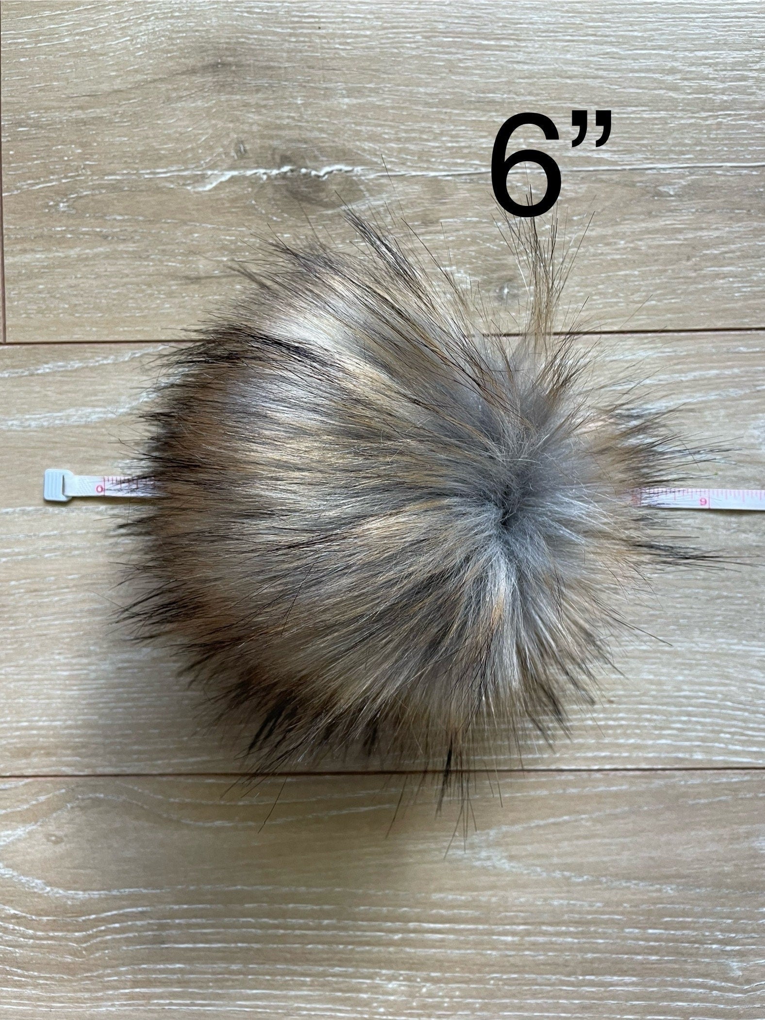 Raccoon luxe faux fur pom pom