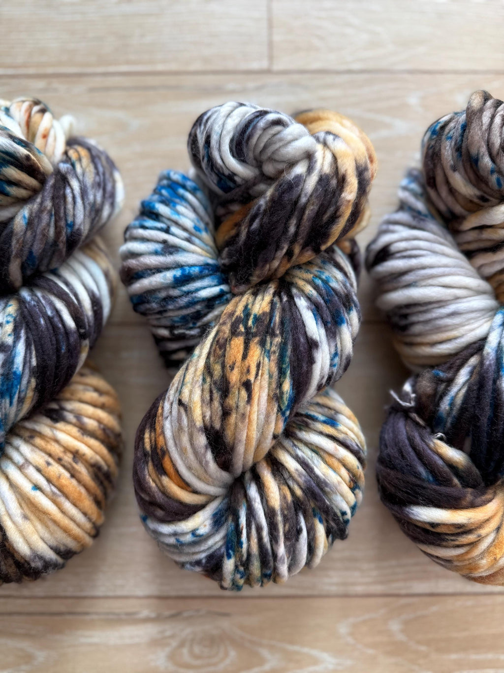 Azriel Hand dyed super bulky merino wool, size 6 blue black gold, speckled, solid, multicolor, indie dye, superwash