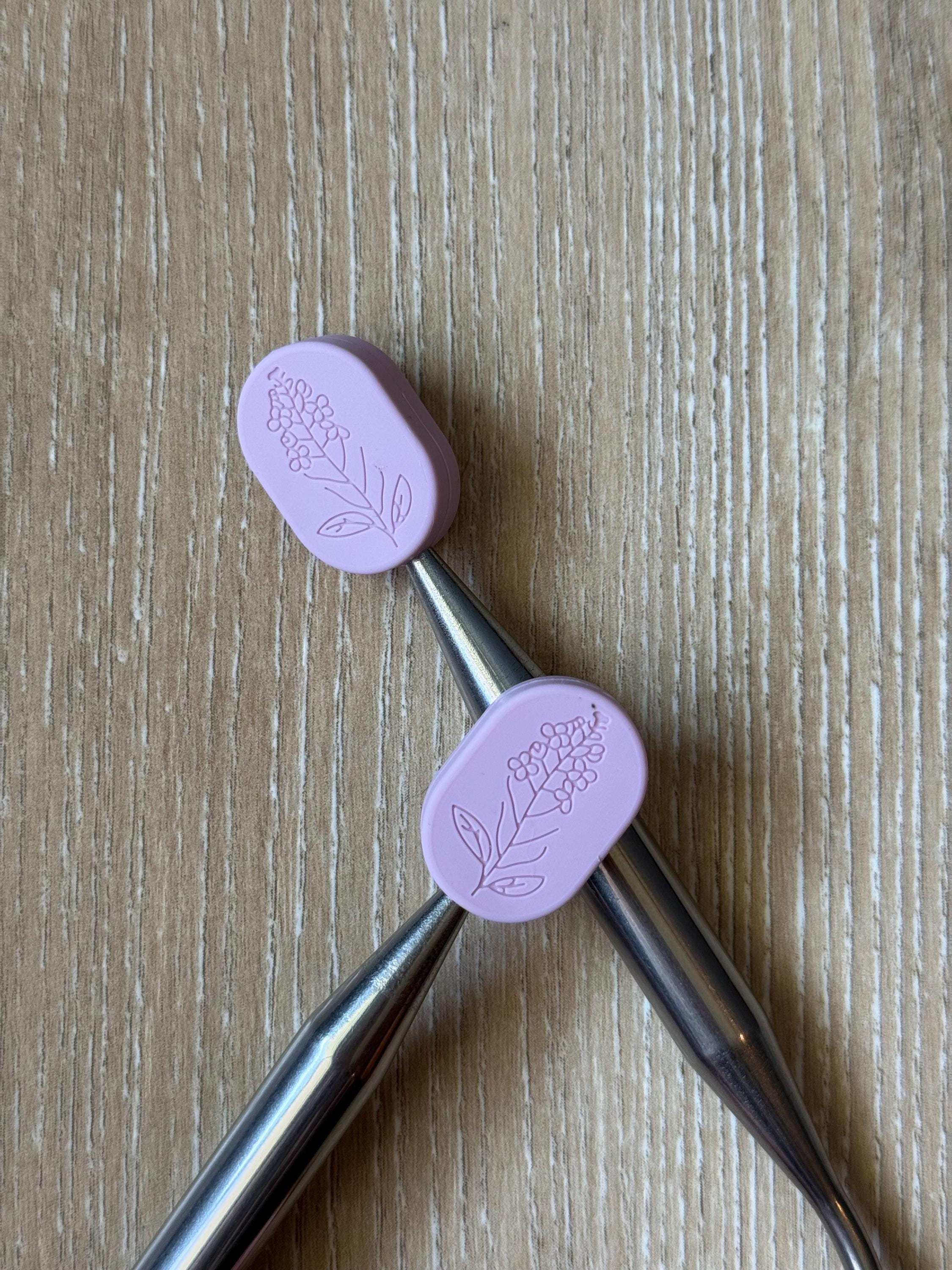 Flower needle stoppers for knitting needles