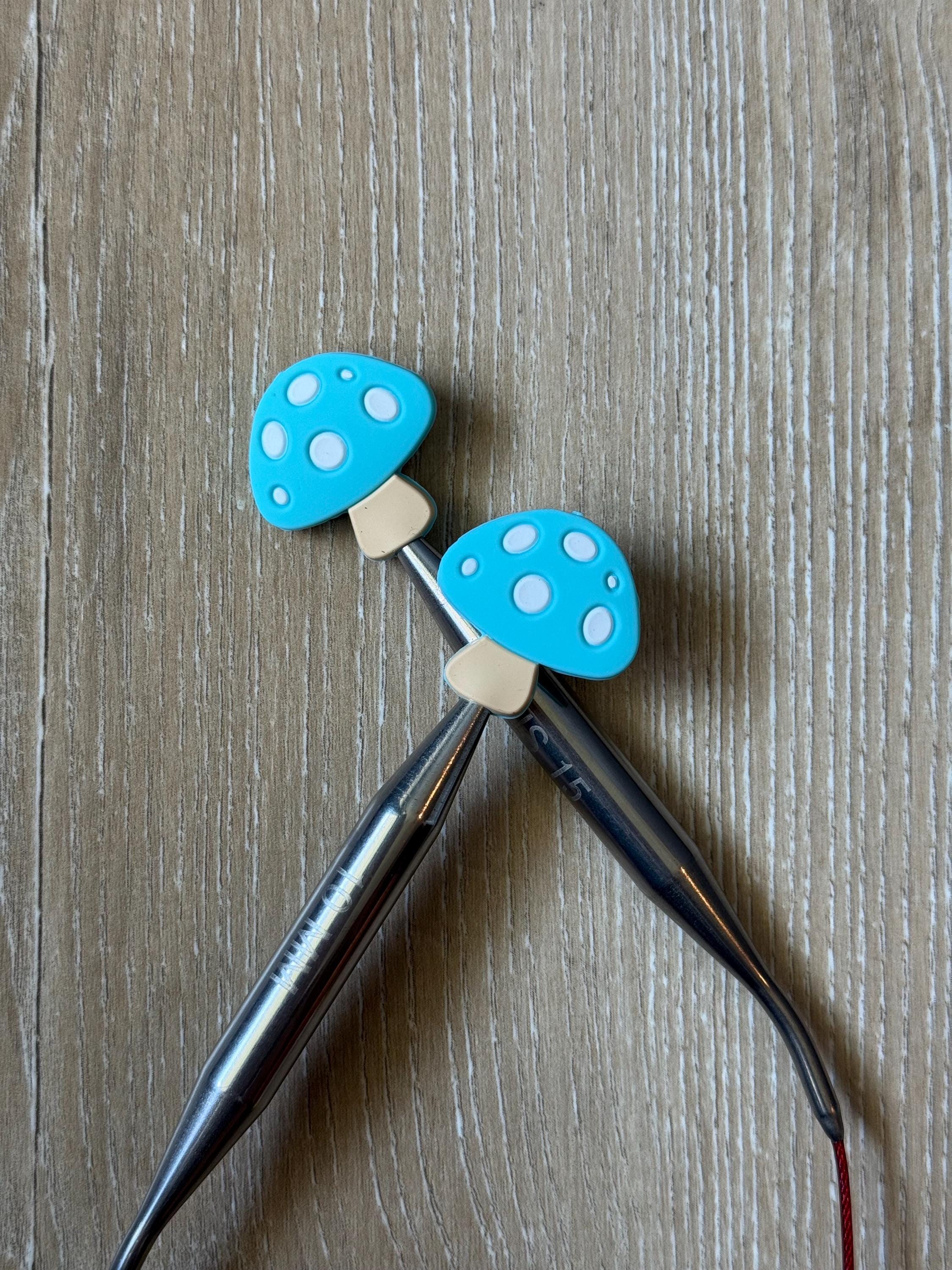 Mushroom needle stoppers for knitting needles