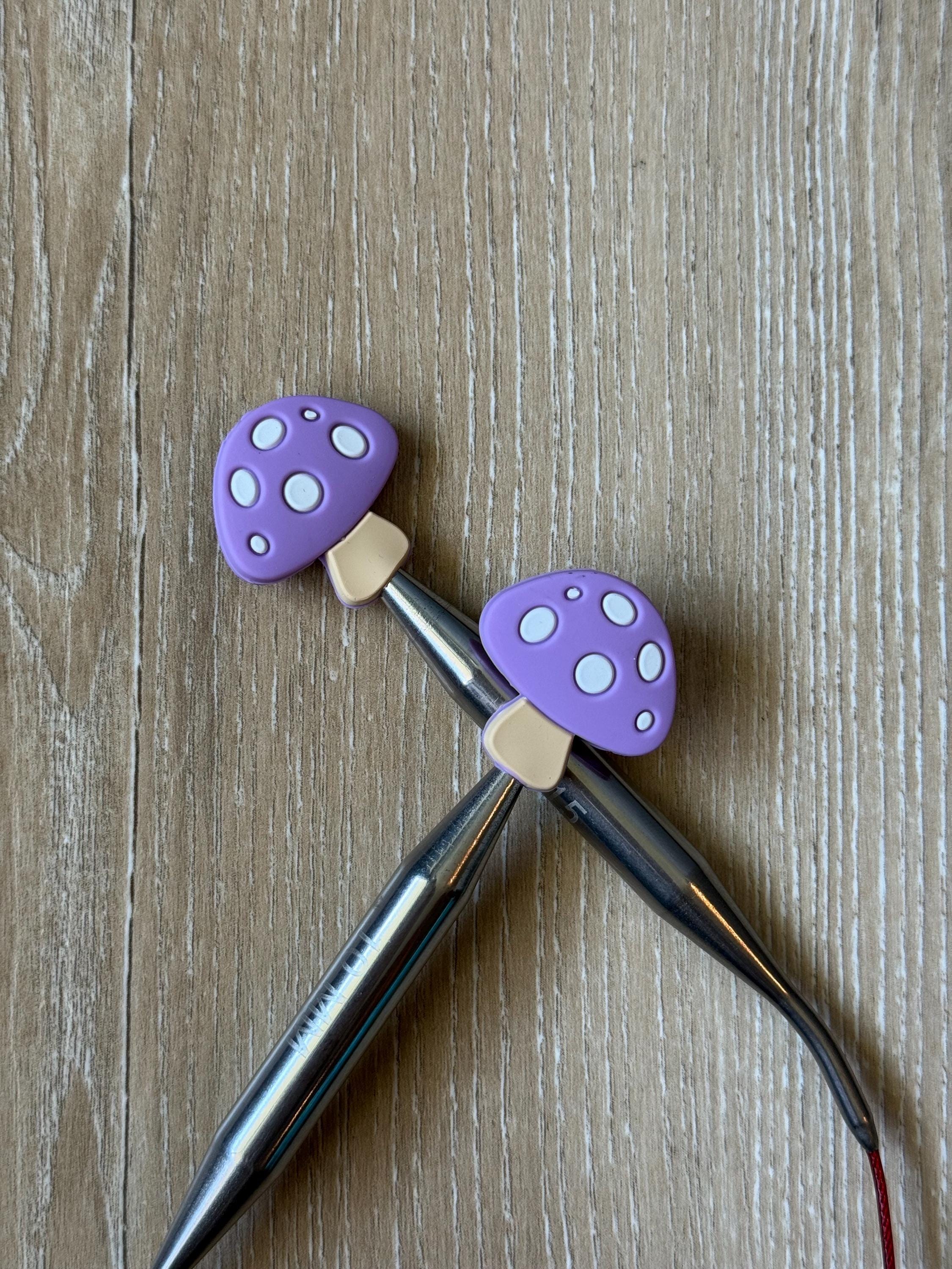 Mushroom needle stoppers for knitting needles