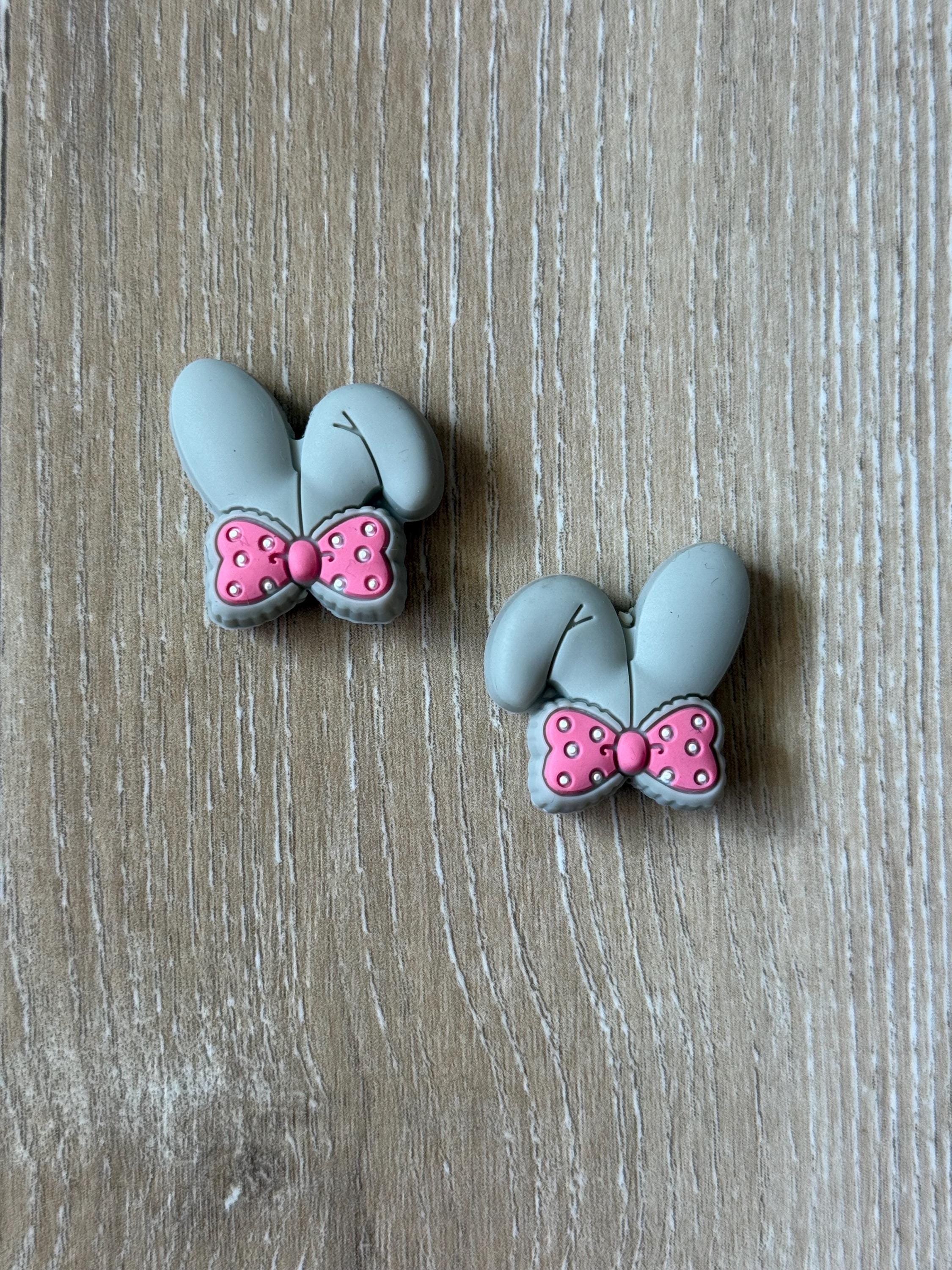 Bunny ears needle stoppers for knitting needles