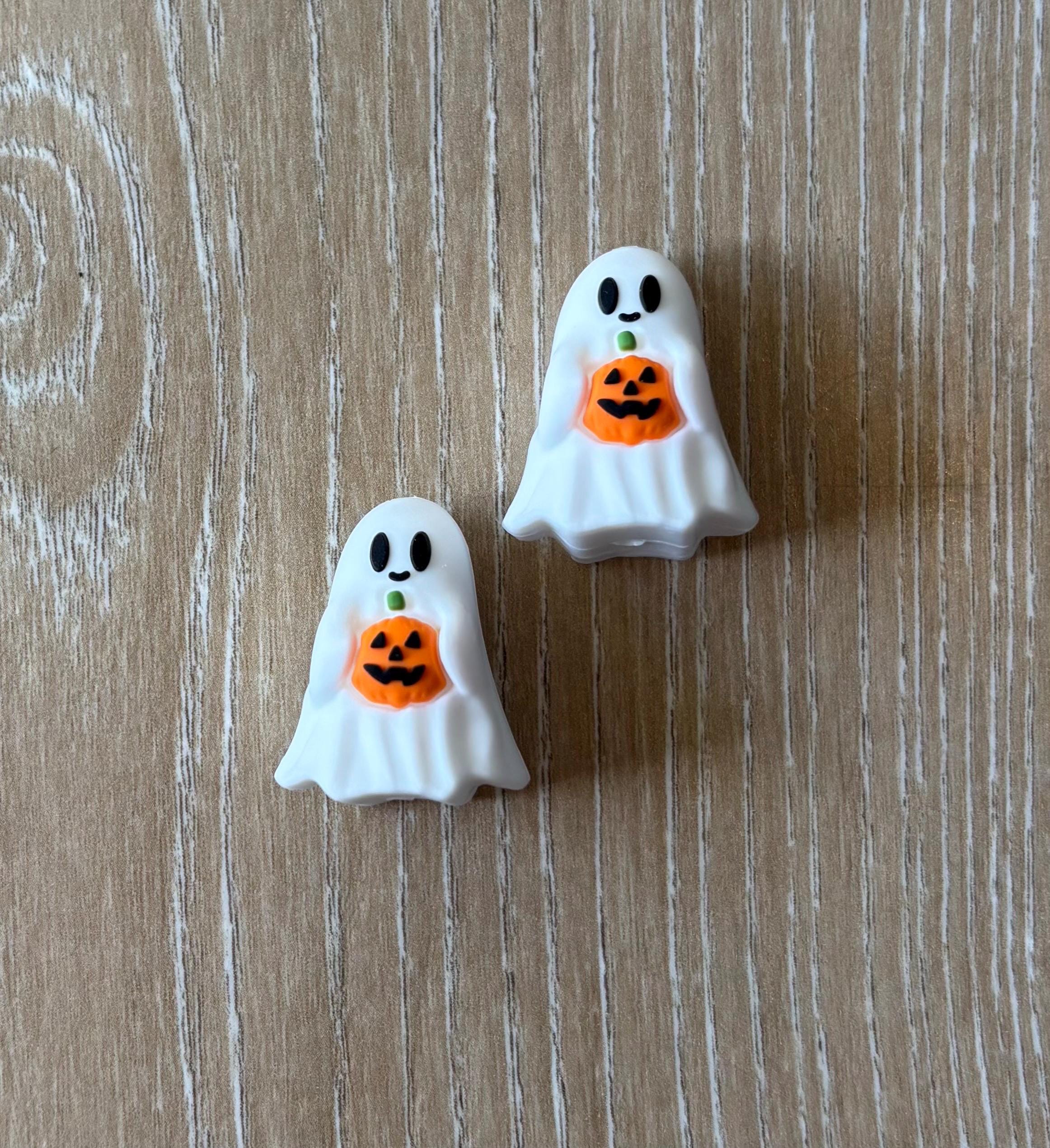 Ghost needle stoppers for knitting needles