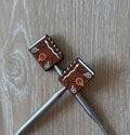 Book needle stoppers for knitting needles
