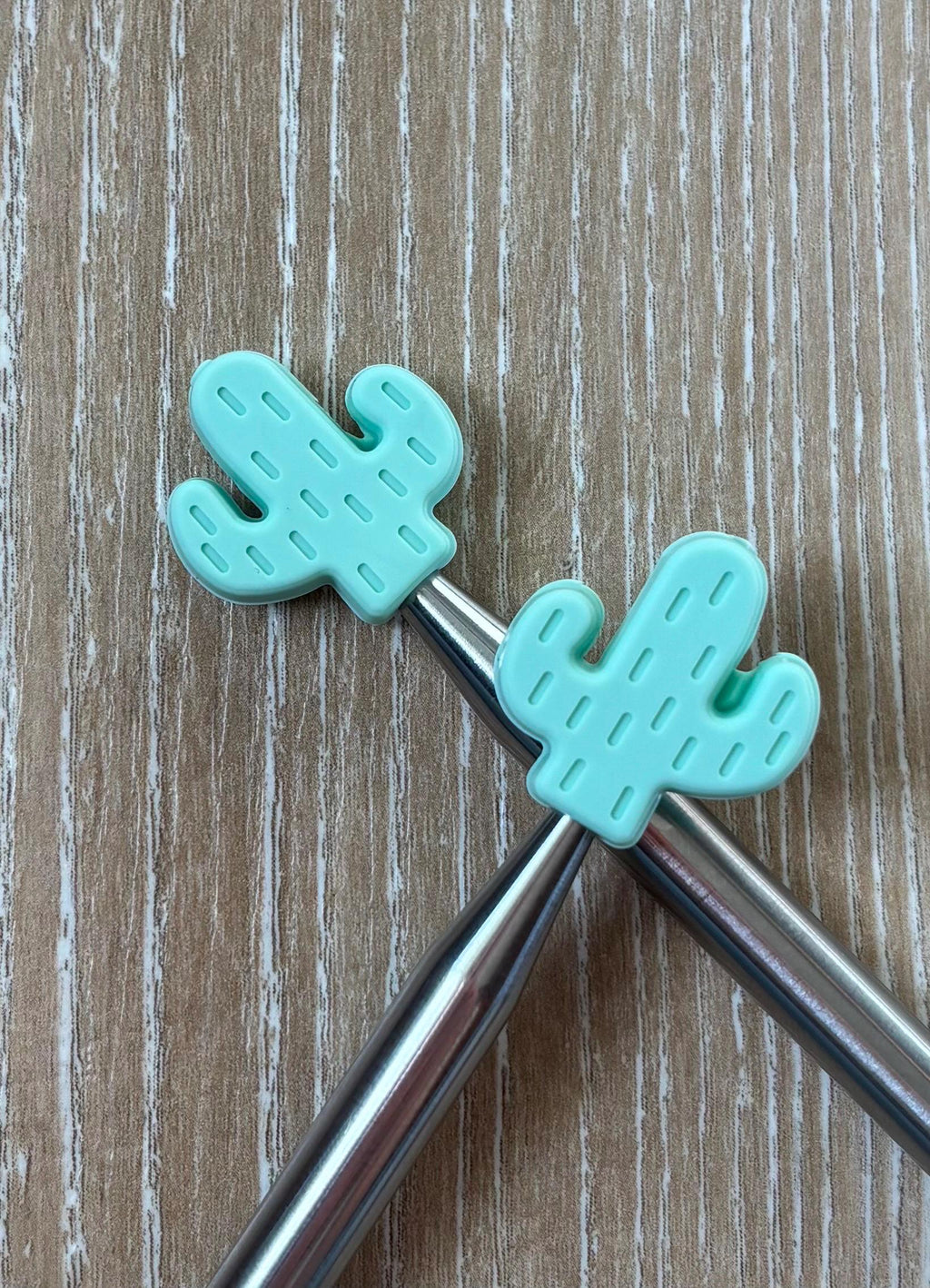 Cactus needle stoppers for knitting needles