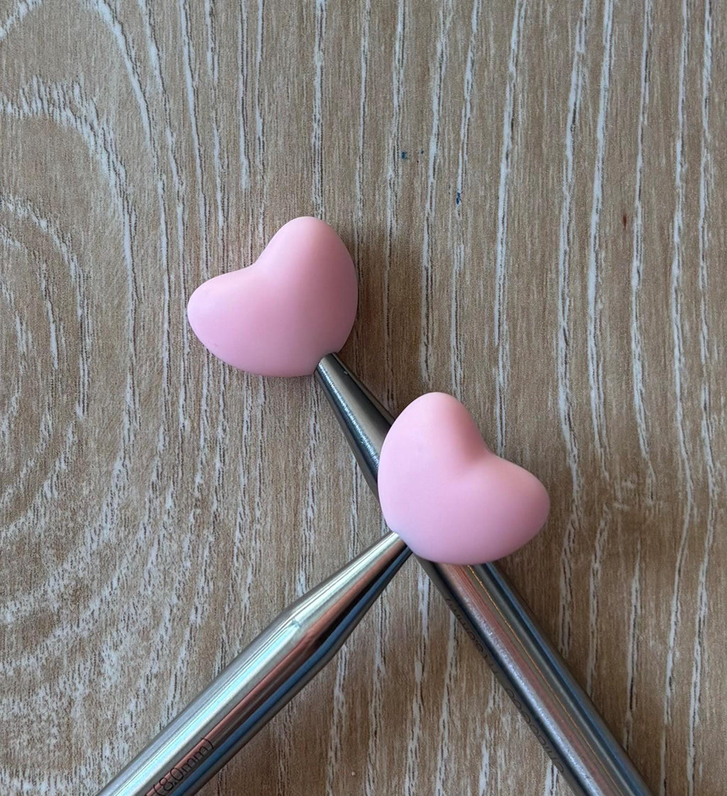 Heart needle stoppers for knitting needles