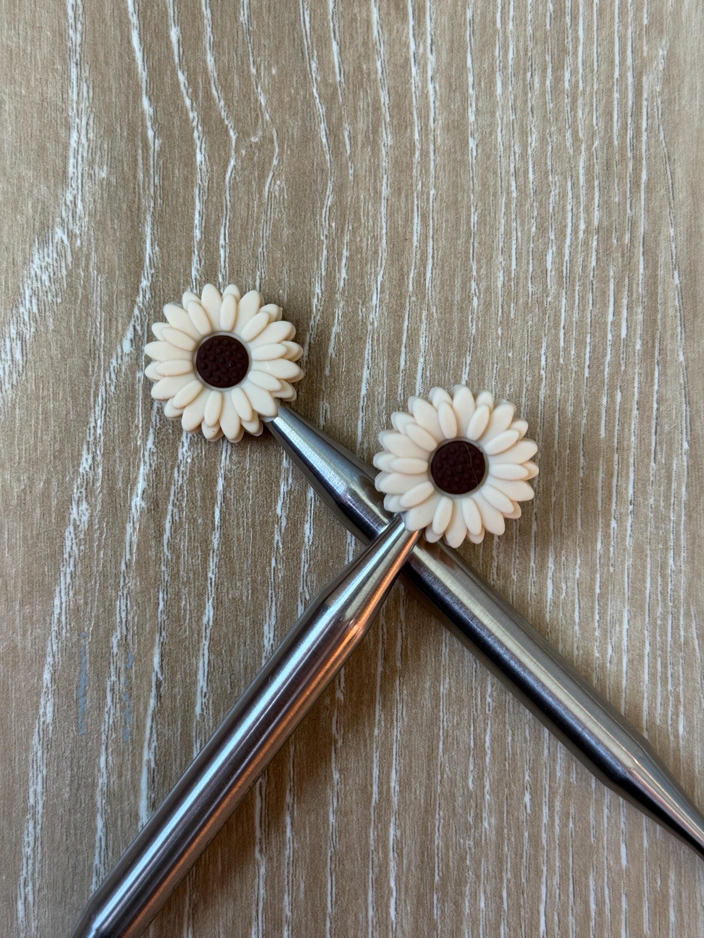 Flower needle stoppers for knitting needles