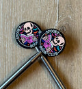 Skeleton needle stoppers for knitting needles