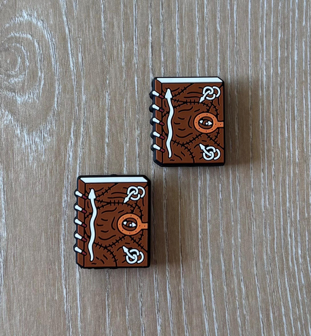 Book needle stoppers for knitting needles