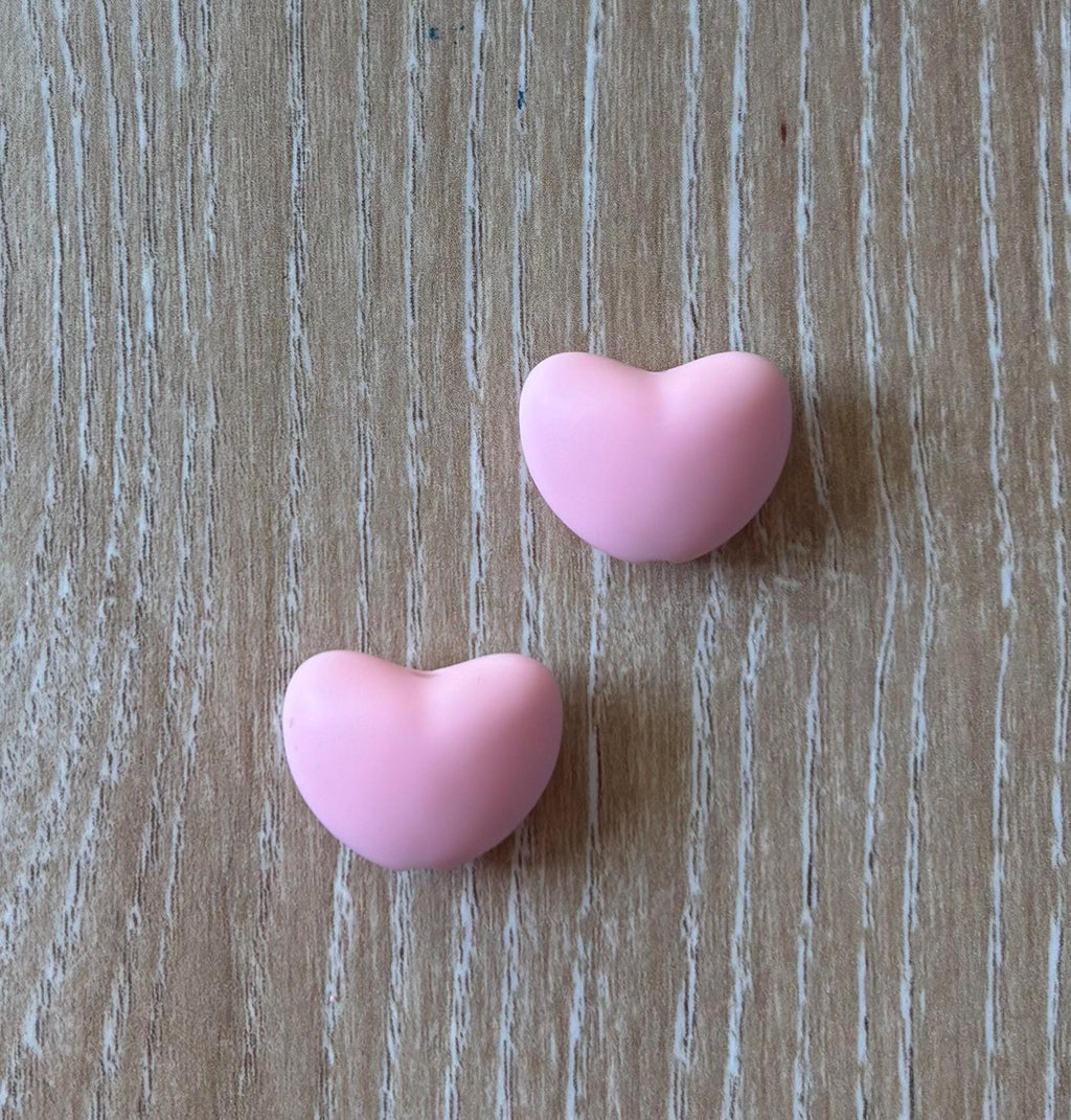 Heart needle stoppers for knitting needles