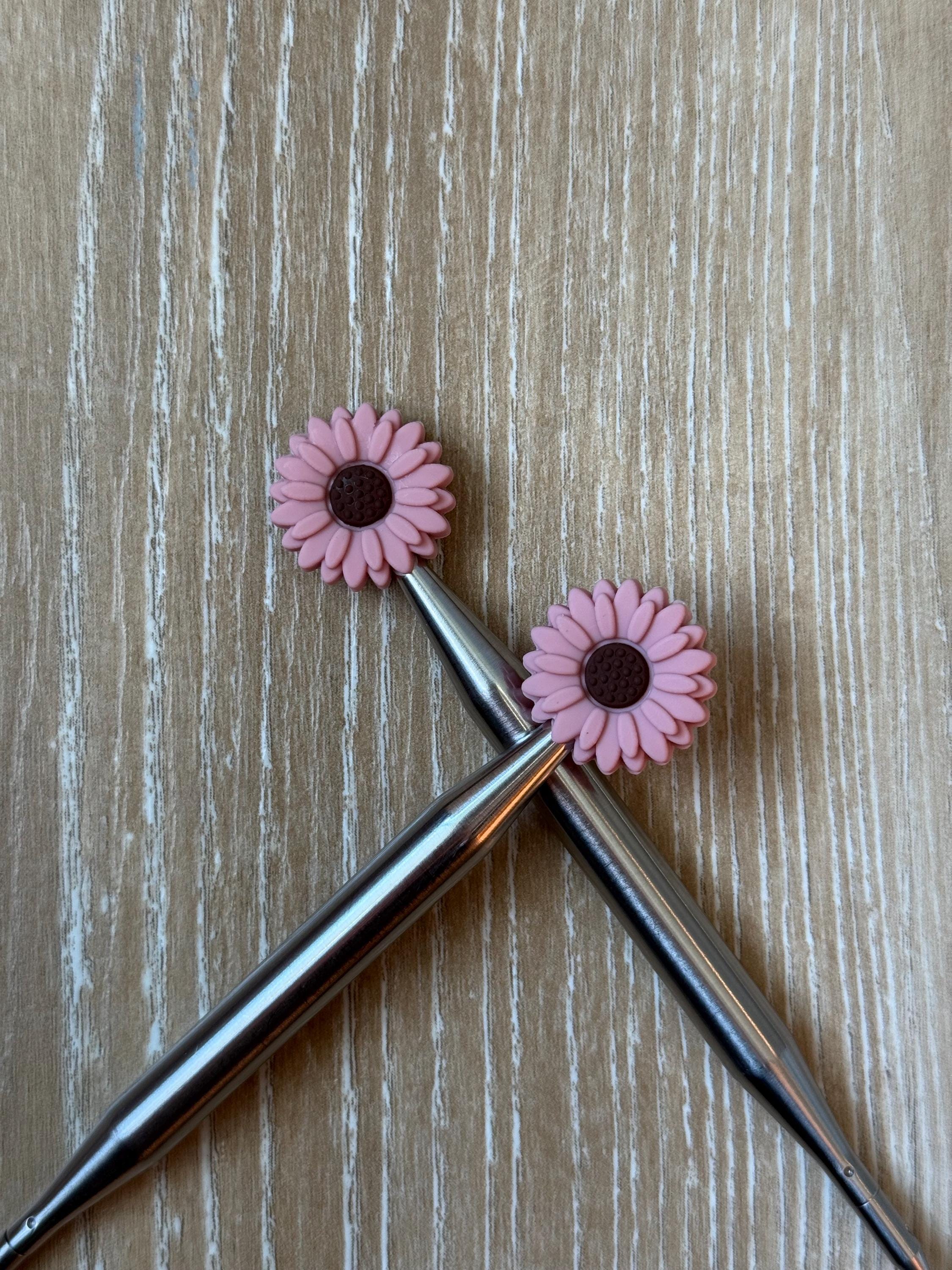 Flower needle stoppers for knitting needles