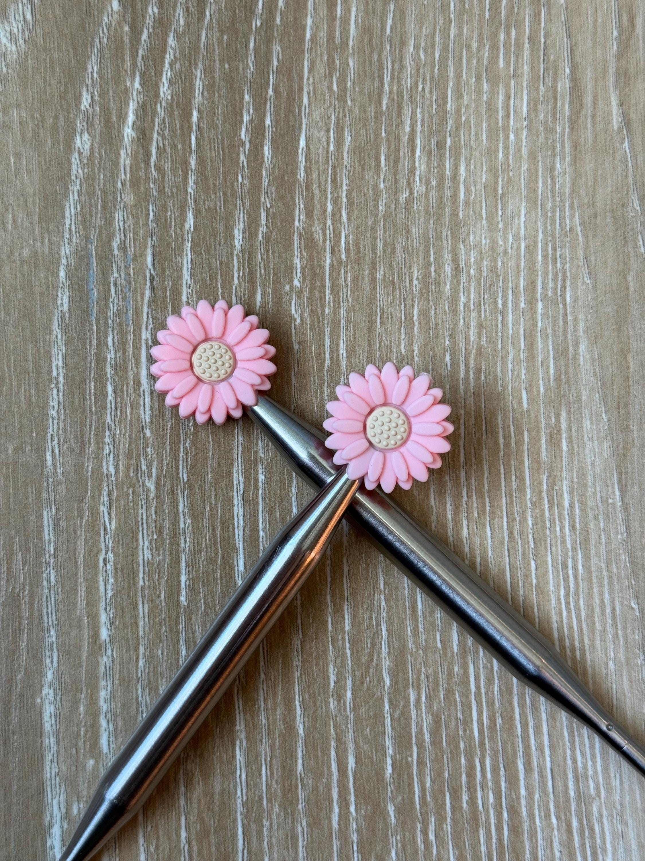 Flower needle stoppers for knitting needles