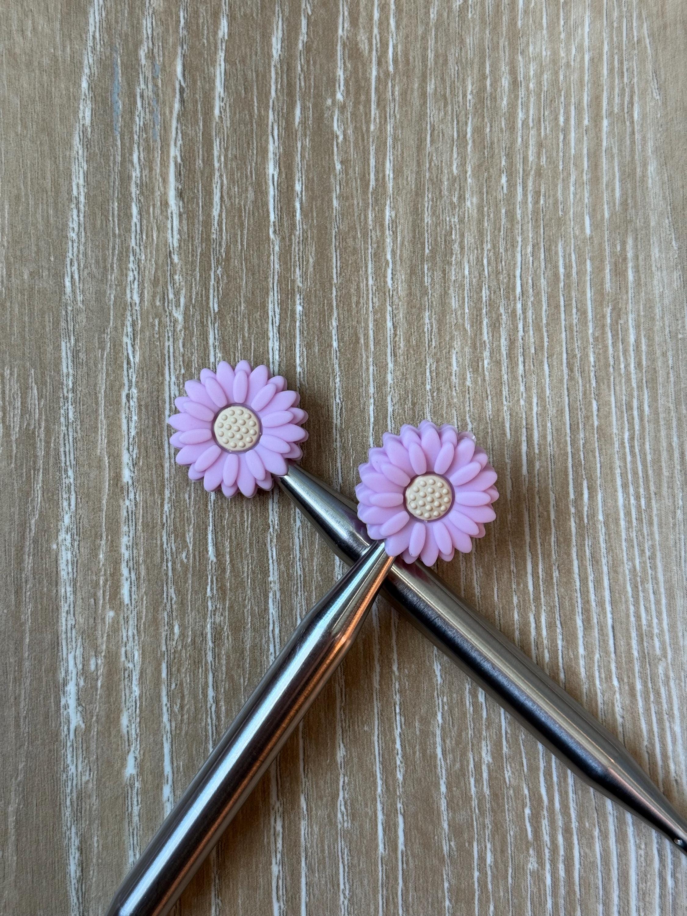 Flower needle stoppers for knitting needles