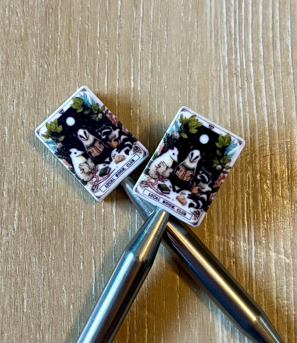 Opossum needle stoppers for knitting needles