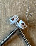 Coffee needle stoppers for knitting
