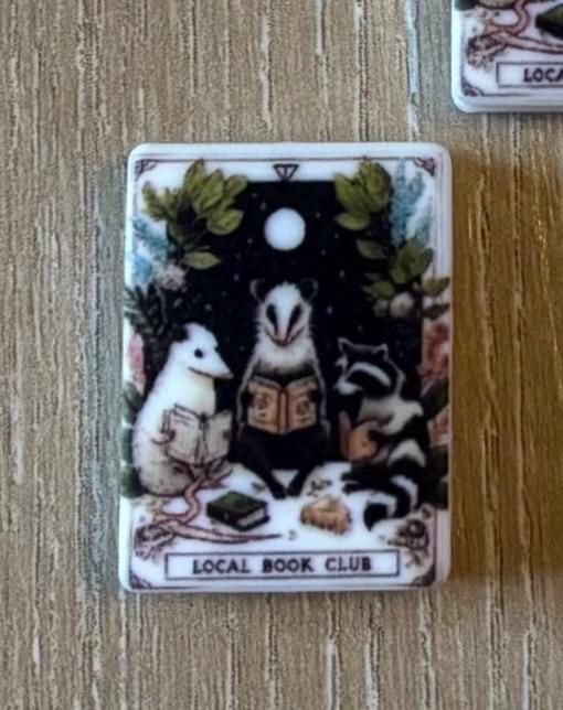 Opossum needle stoppers for knitting needles