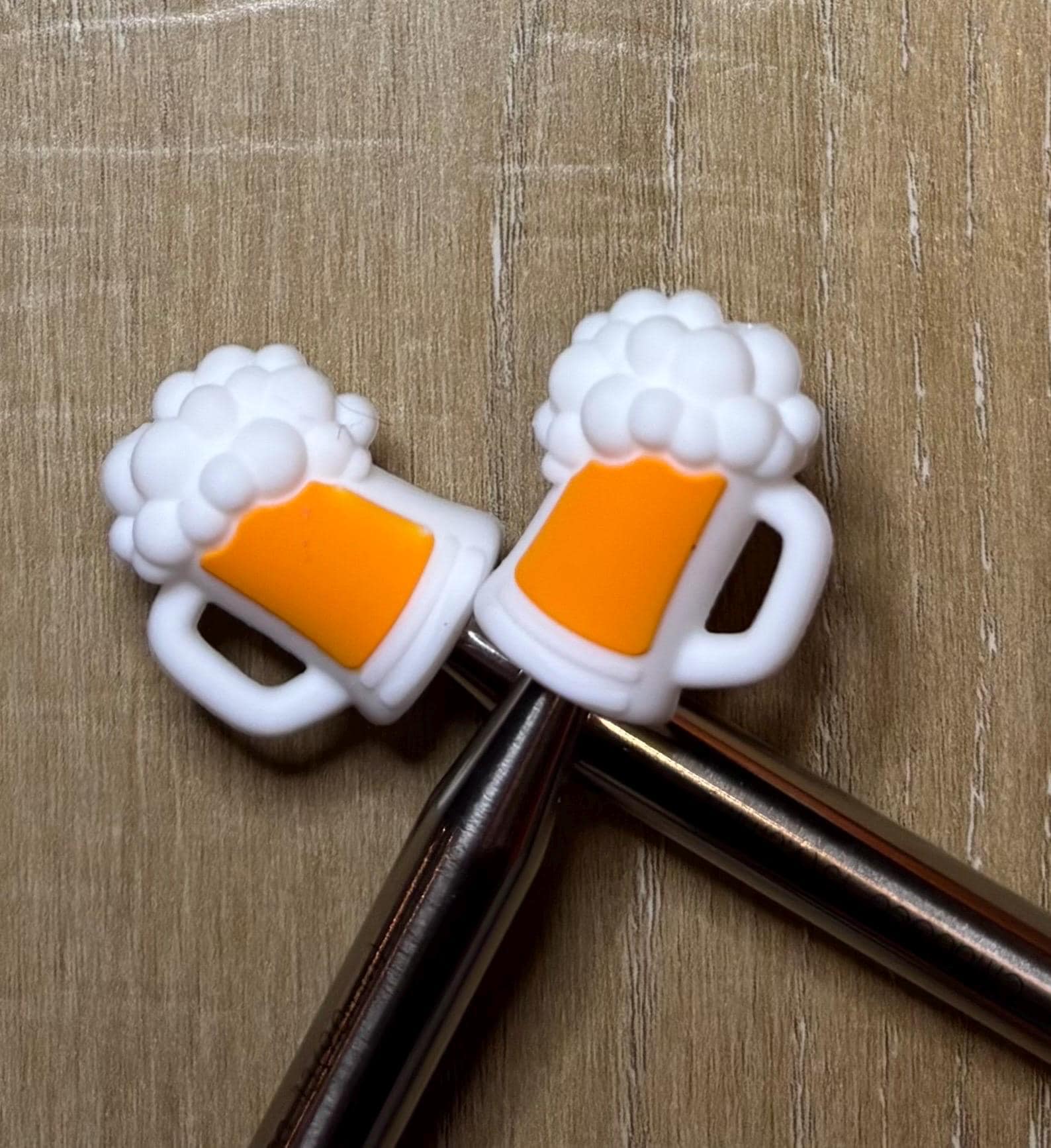 Beer needle stoppers for knitting needles
