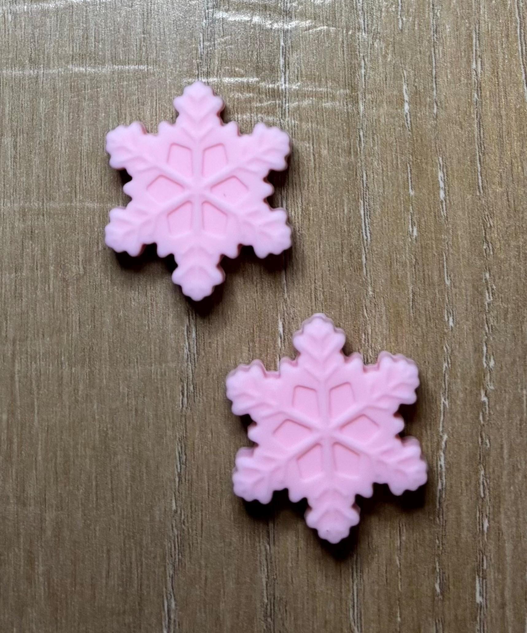 Snowflake needle stoppers for knitting needles