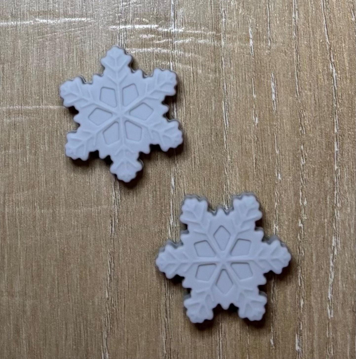 Snowflake needle stoppers for knitting needles