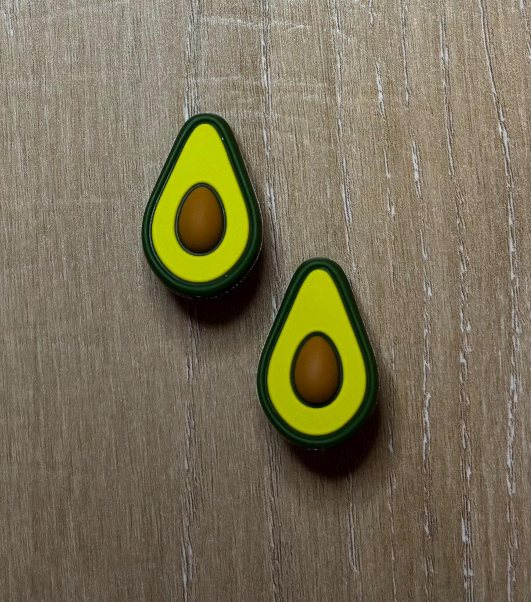Avocado needle stoppers for knitting needles