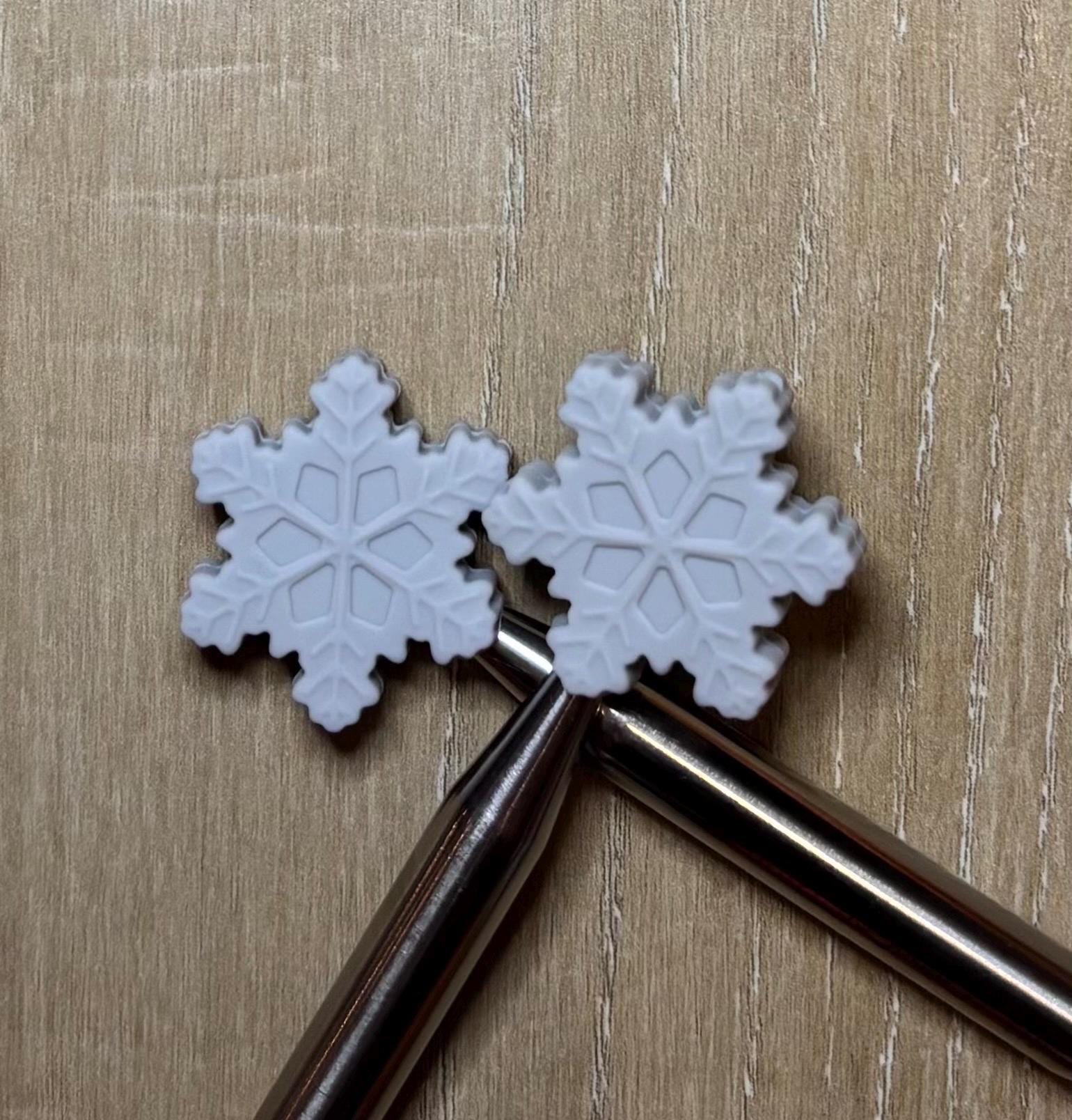 Snowflake needle stoppers for knitting needles
