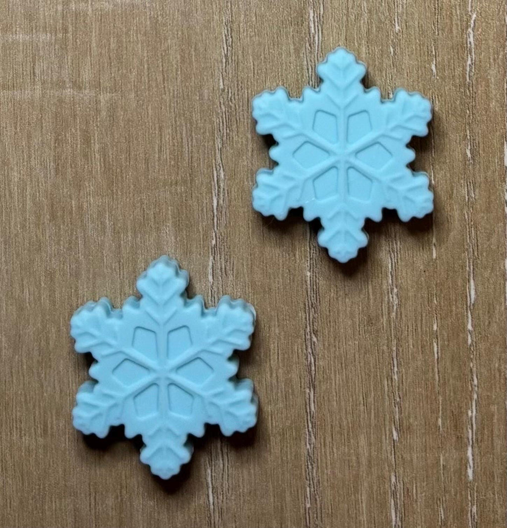 Snowflake needle stoppers for knitting needles
