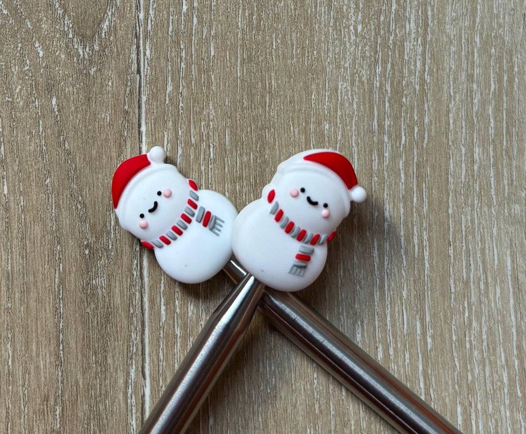 Snowman needle stoppers for knitting needles
