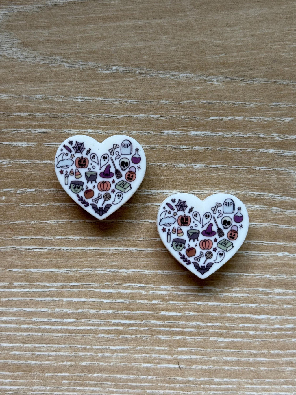 Heart needle stoppers for knitting needles
