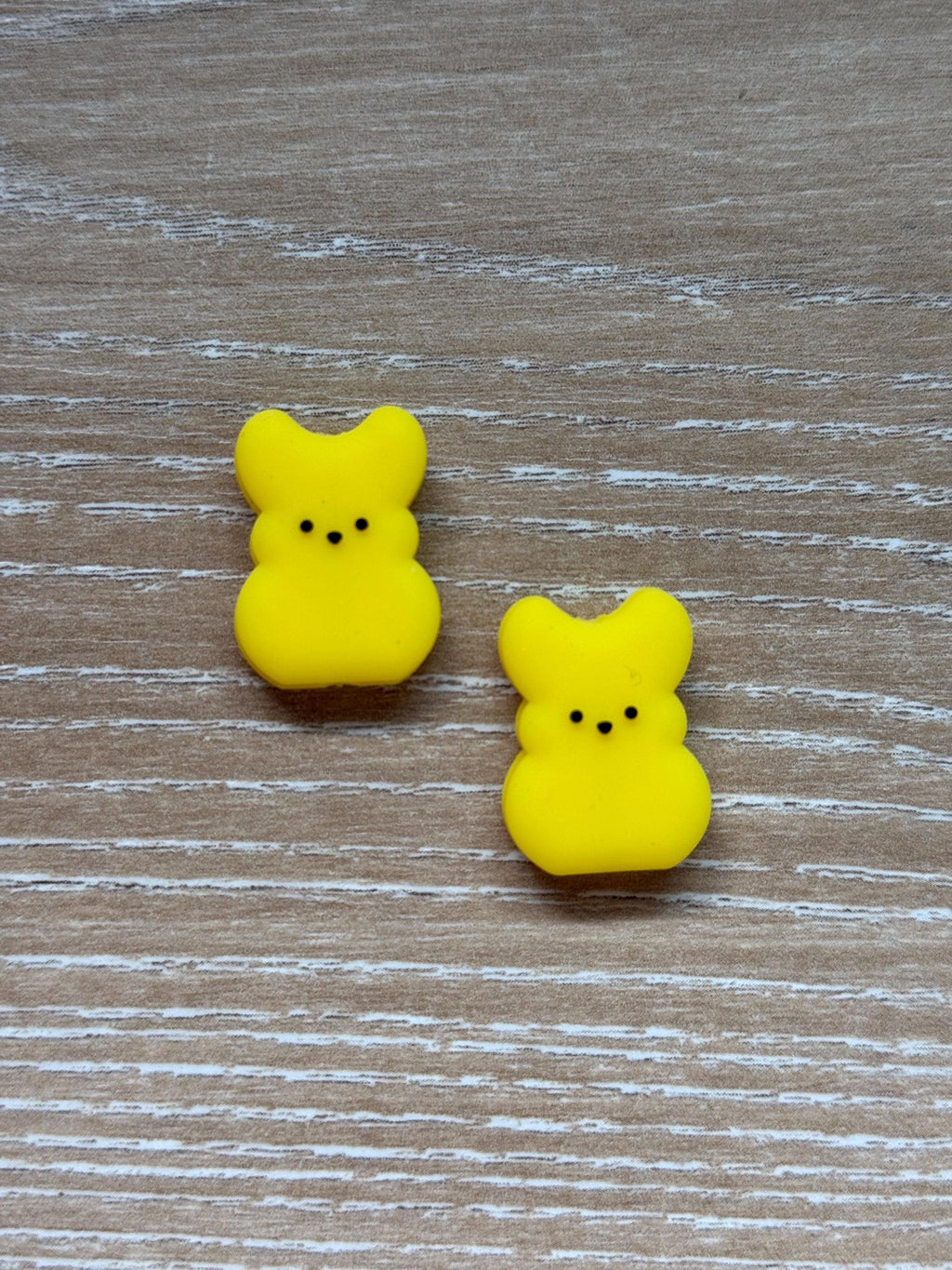 Peeps needle stoppers for knitting needles
