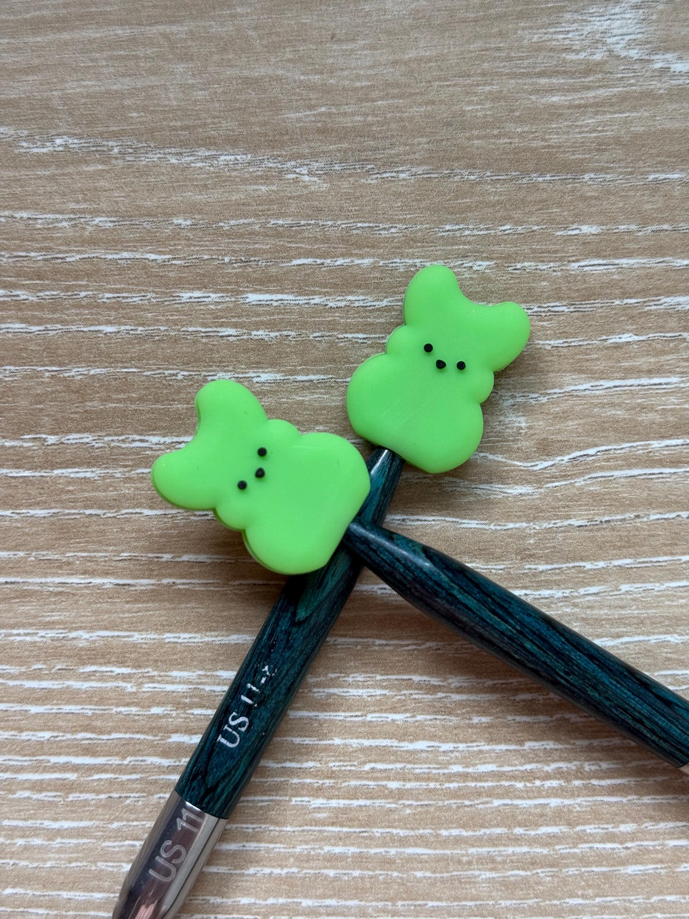 Peeps needle stoppers for knitting needles