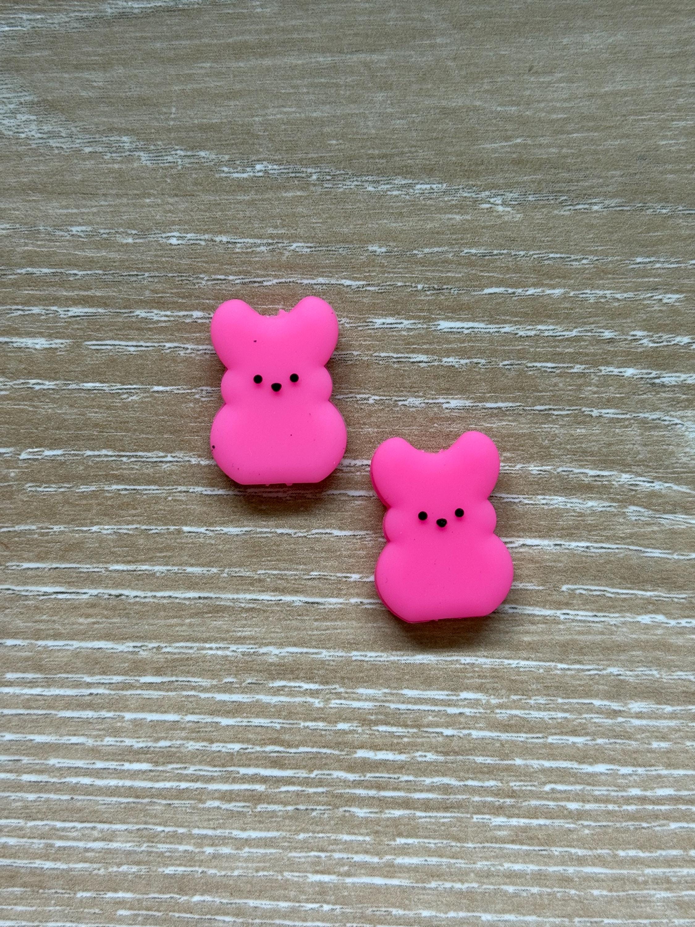 Peeps needle stoppers for knitting needles