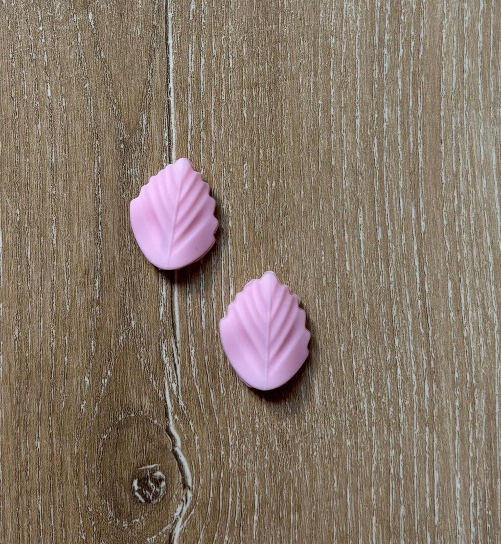 Leaf needle stoppers for knitting needles