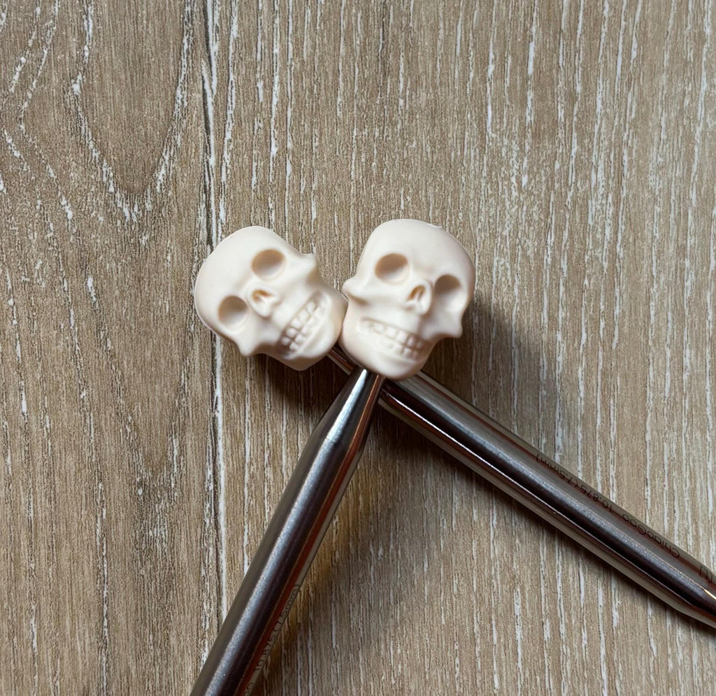 Skull needle stoppers for knitting needles