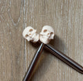 Skull needle stoppers for knitting needles