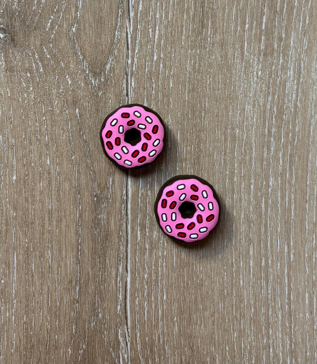Donut needle stoppers for knitting needles