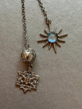 Sun and snowflake handmade metal bookmark
