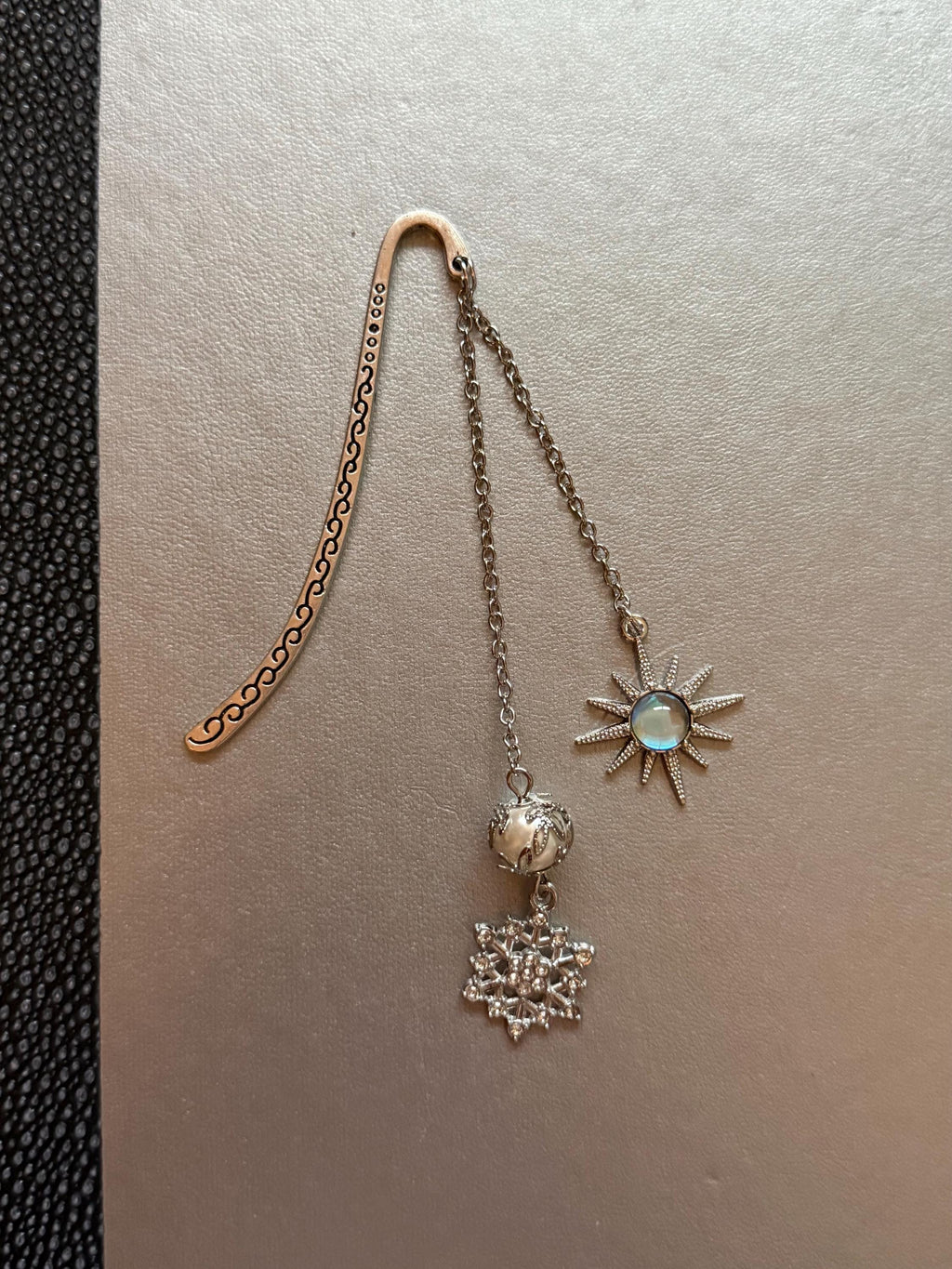 Sun and snowflake handmade metal bookmark