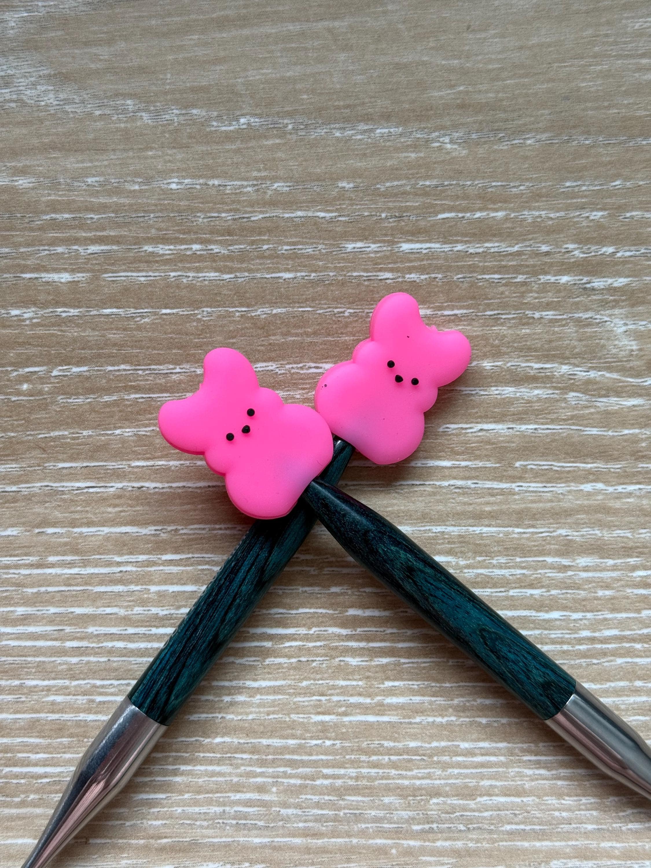 Peeps needle stoppers for knitting needles